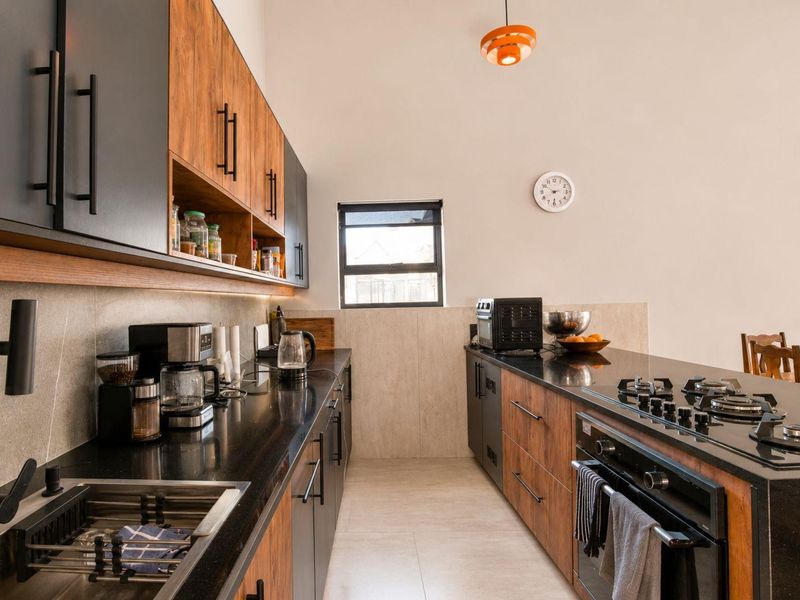 Modern 3-Bedroom Home with Luxury En-Suite Living in Outeniquasbosch Wildlife Village - Photo 6