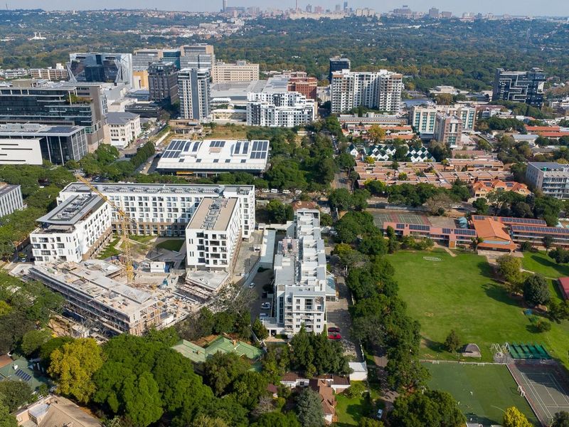 An aerial view of the surrounding urban landscape and residential development area.