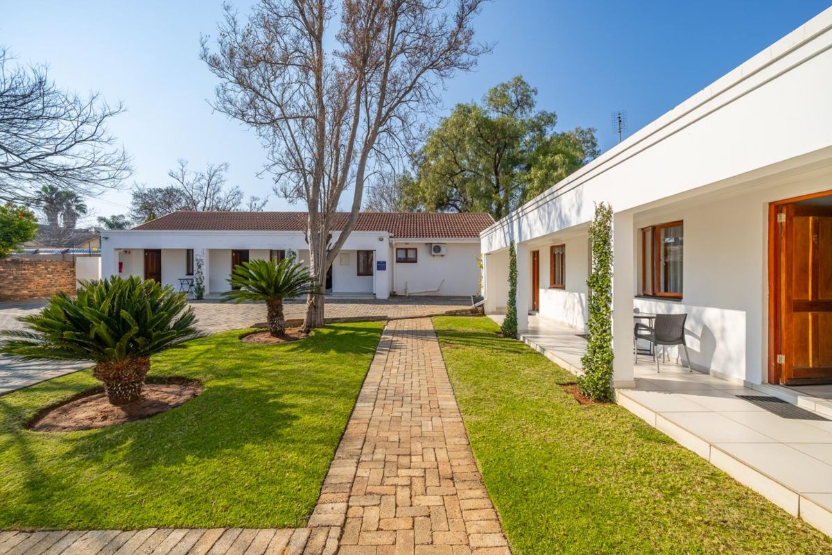 Established 12 Suite Guest House | Proven Hospitality Business | Flamwood, Klerksdorp - Photo 3