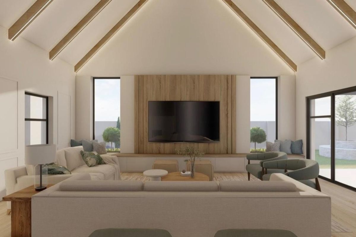 Spacious living room featuring a high vaulted ceiling with exposed timber beams, integrated lighting, and a modern timber feature wall with built-in cabinetry.