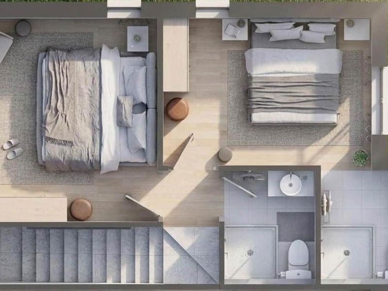 A detailed architectural floor plan showing the layout of two bedrooms, a staircase, and two bathrooms.