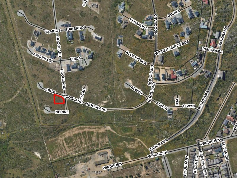 Aerial view of the residential area showing the location of the vacant land plot highlighted in red.