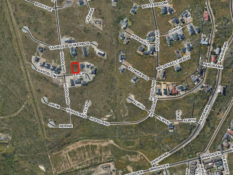 An aerial satellite view of a residential estate showing the location of the vacant land plot highlighted in red.