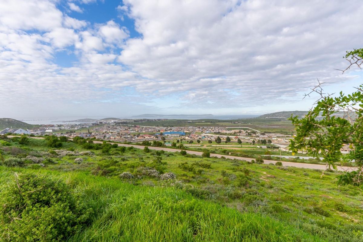 Expansive elevated view overlooking the surrounding residential landscape and distant coastal horizon.