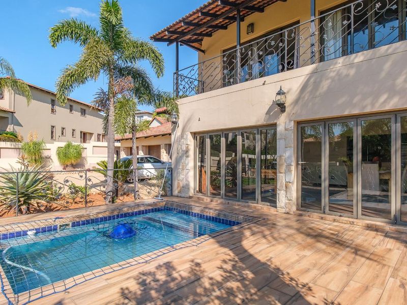 Discover Refined Estate Living in this Charming 4 Bedroom Featherbrooke Cluster - Photo 3