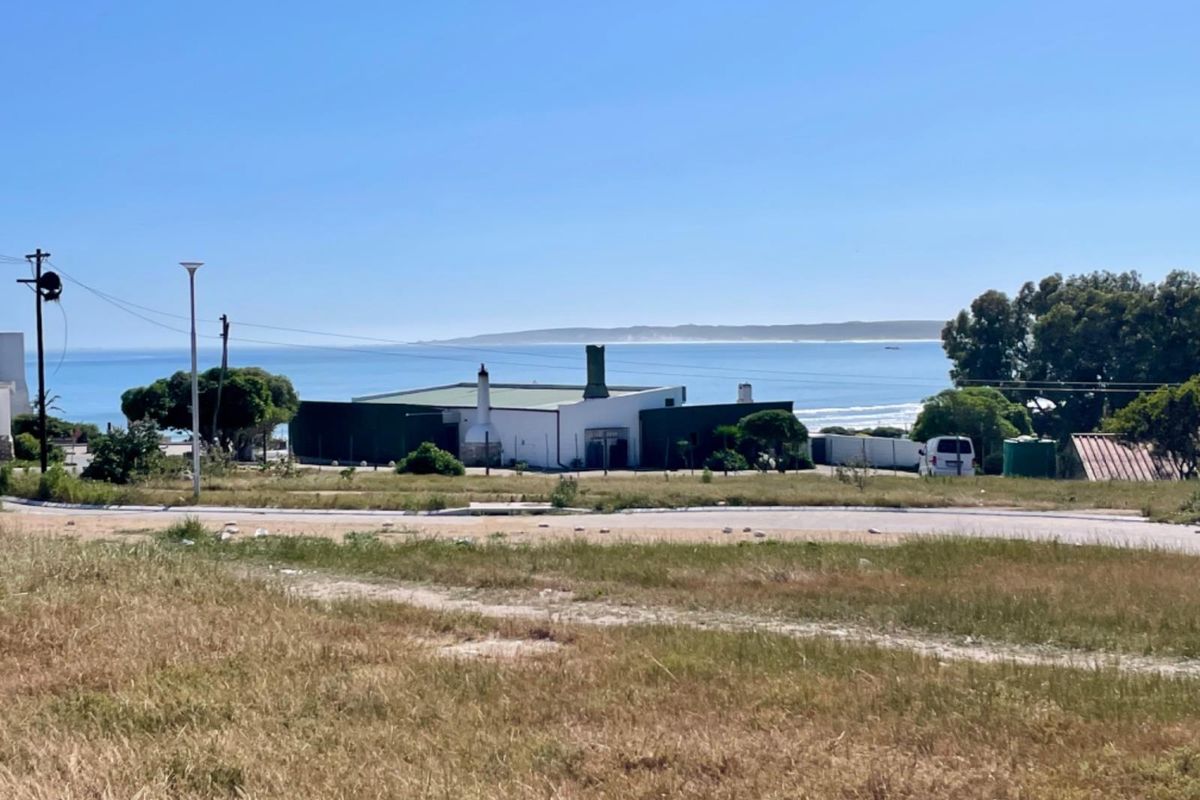 A scenic view of the coastline and ocean from the vacant residential land, showcasing the property's proximity to the sea.