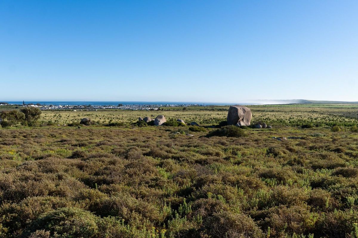 Expansive view of the natural landscape and coastal horizon from the vacant residential land.