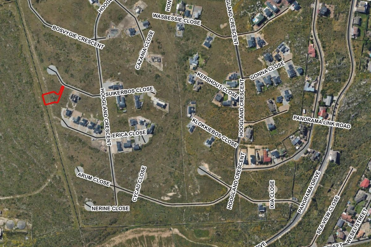 An aerial view of the residential estate showing the location of the vacant land plot highlighted in red.
