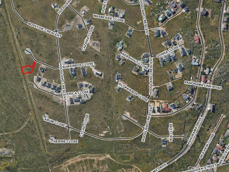An aerial view of the residential estate showing the location of the vacant land plot highlighted in red.