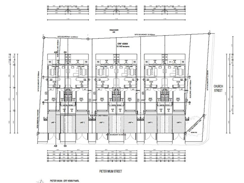 Architectural ground floor plan showing the layout of six townhouse units with garages, kitchens, and living areas.