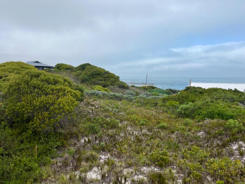 A scenic view of the coastal landscape and ocean from the vacant residential property.