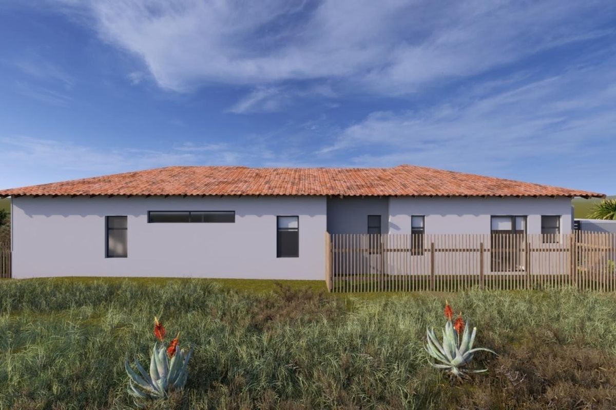 A rear view of a modern single-story house featuring a terracotta tiled roof and timber slat fencing set against a natural landscape.