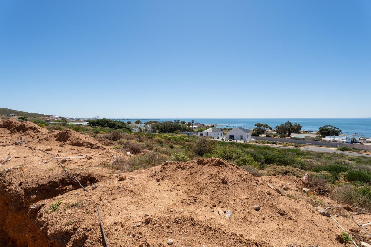 Elevated view overlooking the coastal landscape and ocean from the vacant residential plot.