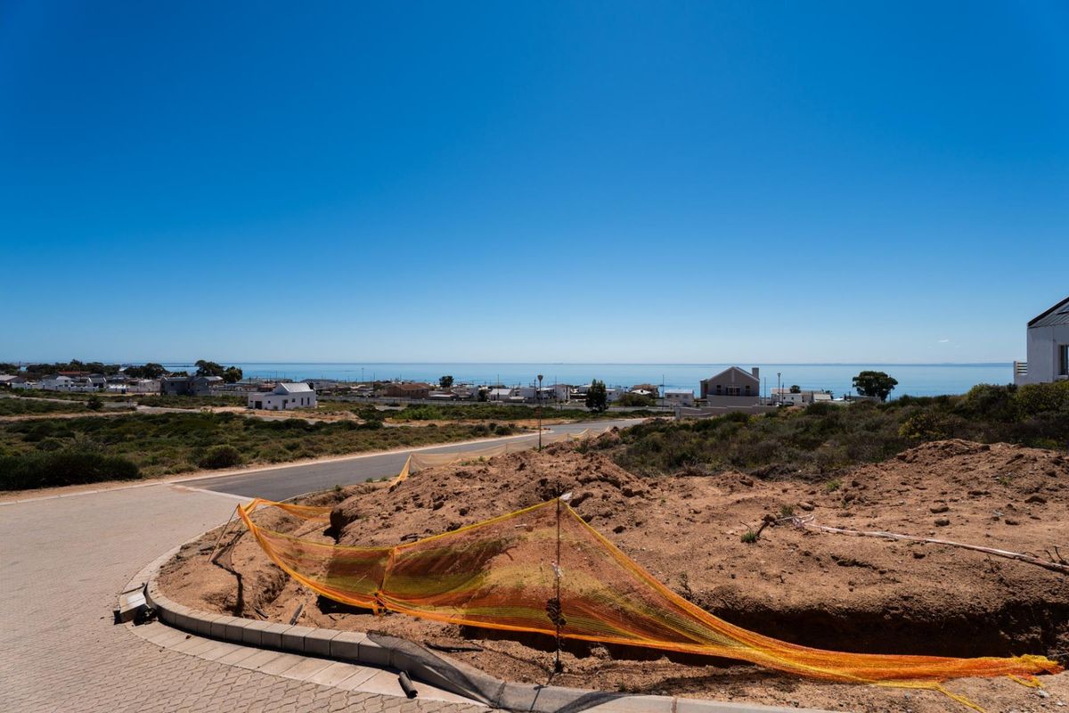 A view of the surrounding residential area and coastline from the vacant residential plot.