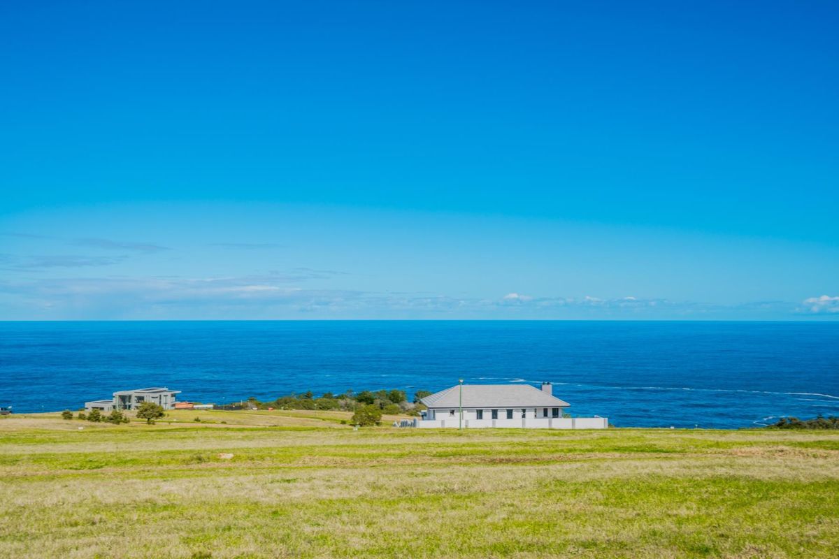 A scenic view of the coastal landscape and ocean from the vacant residential land.