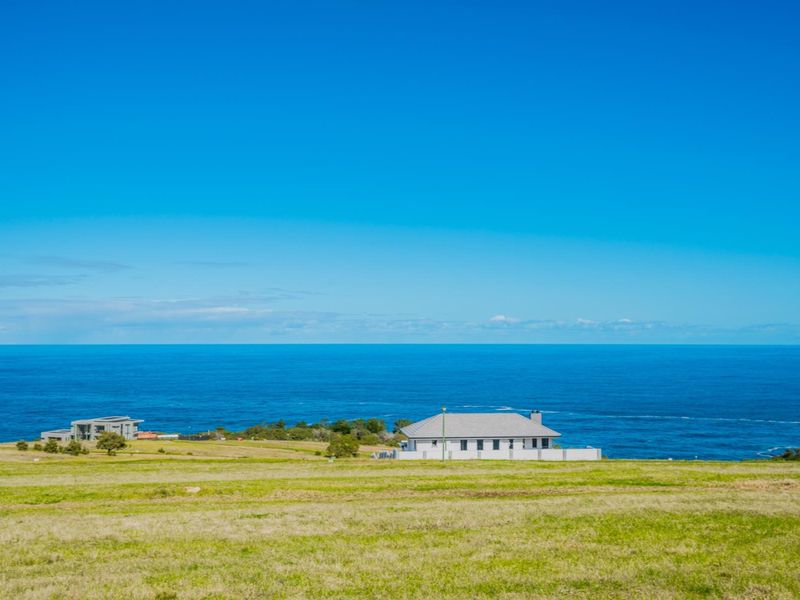 A scenic view of the coastal landscape and ocean from the vacant residential land.