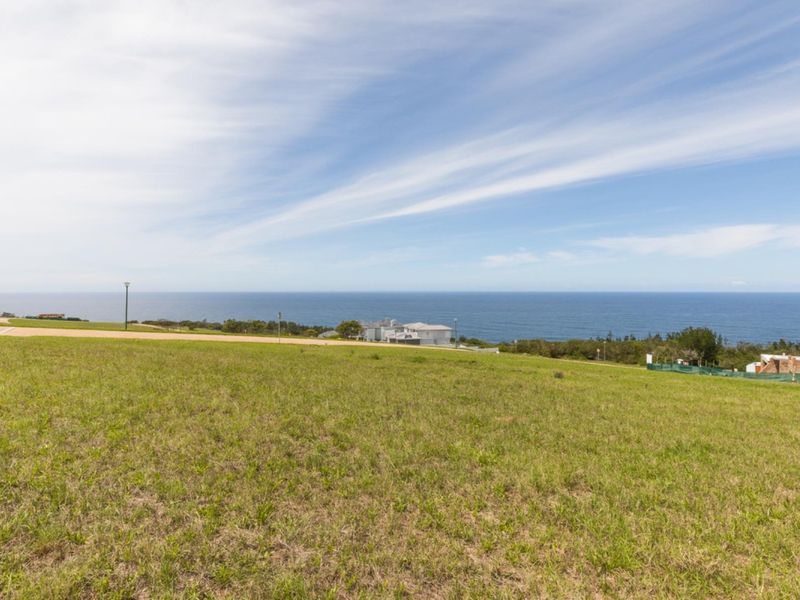 A scenic view of the coastal landscape and ocean from the vacant residential land.