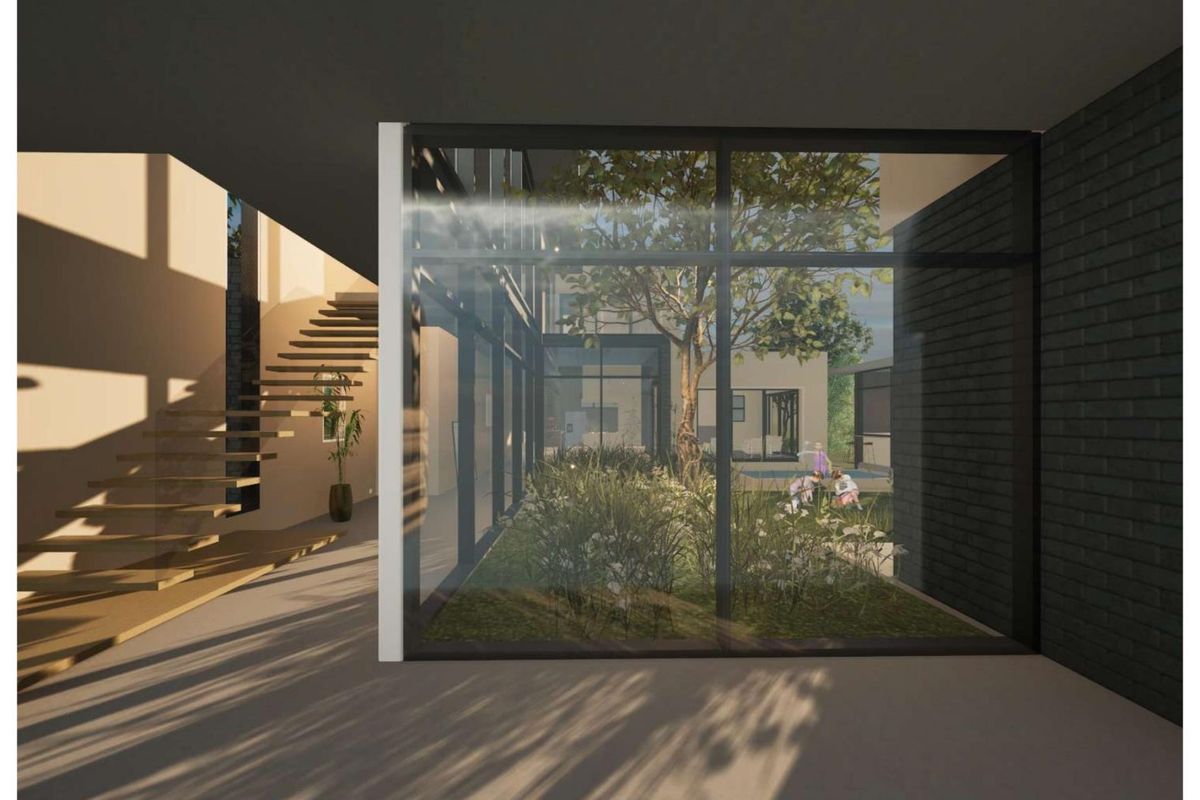 Modern architectural interior featuring a floating staircase and floor-to-ceiling glass walls overlooking a landscaped courtyard and pool area.