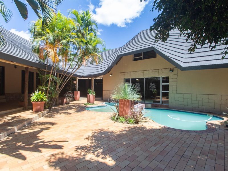 Exceptional Multi-Use Property with Main Home, Flatlets and Pool - Photo 1