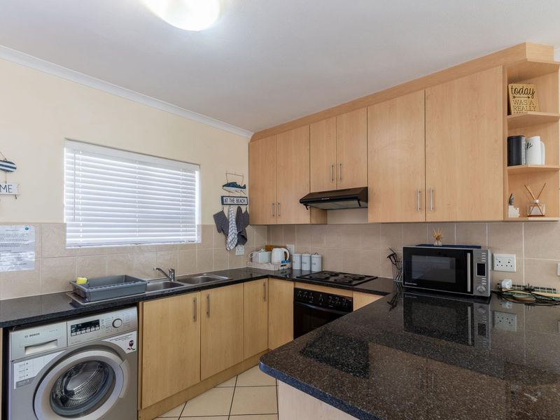 Stylish 2-Bedroom with Private Balconies and Built-In Braai in Hartenbos - Photo 10