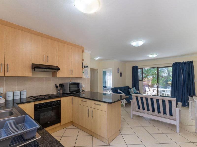 Stylish 2-Bedroom with Private Balconies and Built-In Braai in Hartenbos - Photo 9