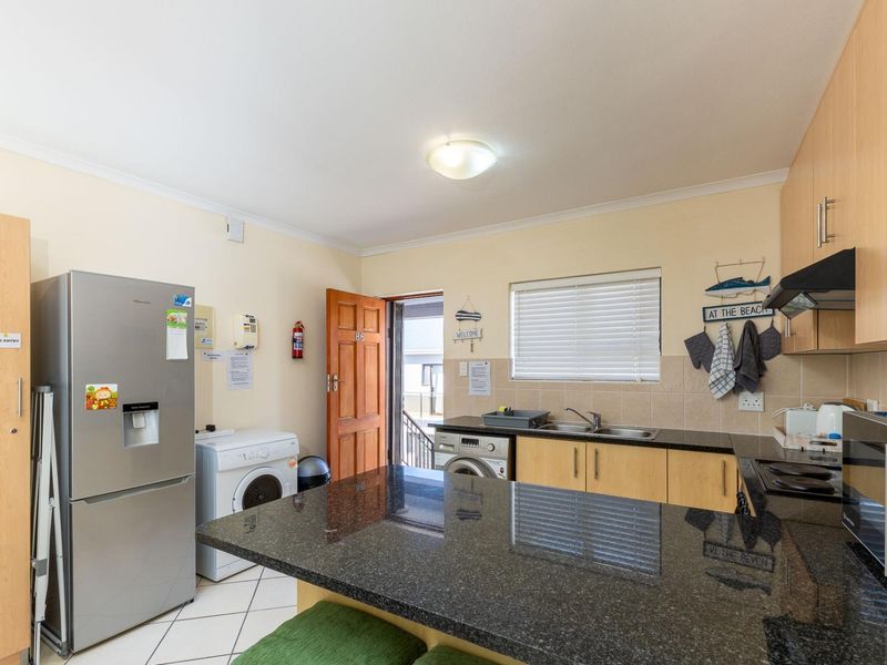 Stylish 2-Bedroom with Private Balconies and Built-In Braai in Hartenbos - Photo 8