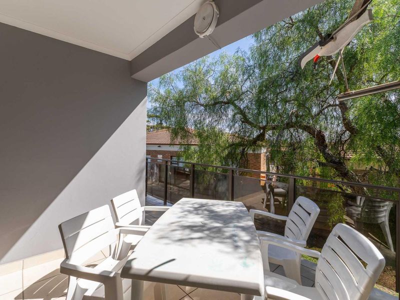 Stylish 2-Bedroom with Private Balconies and Built-In Braai in Hartenbos - Photo 1