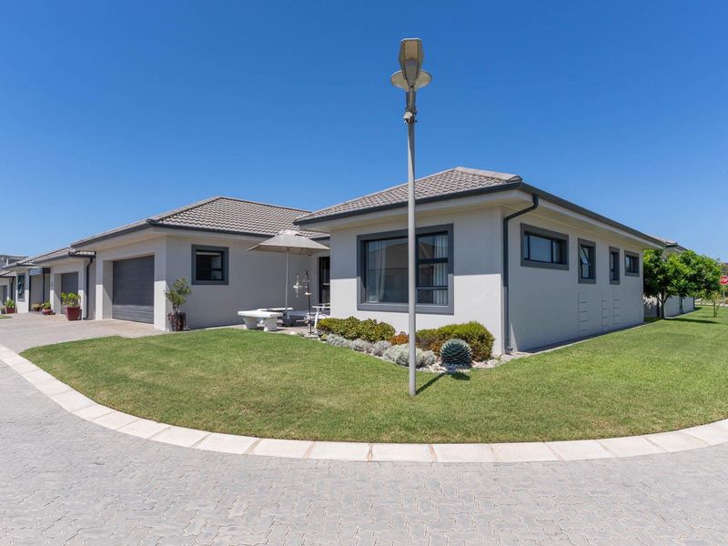 Are you over 50? Retire in style within walking distance of the sea. - Photo 4