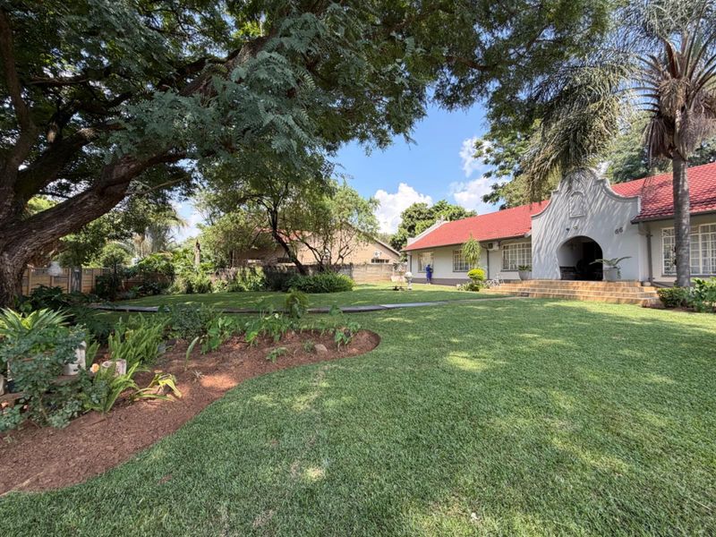 Big Family Home with Endless Potential -Protea Park Rustenburg - Photo 1
