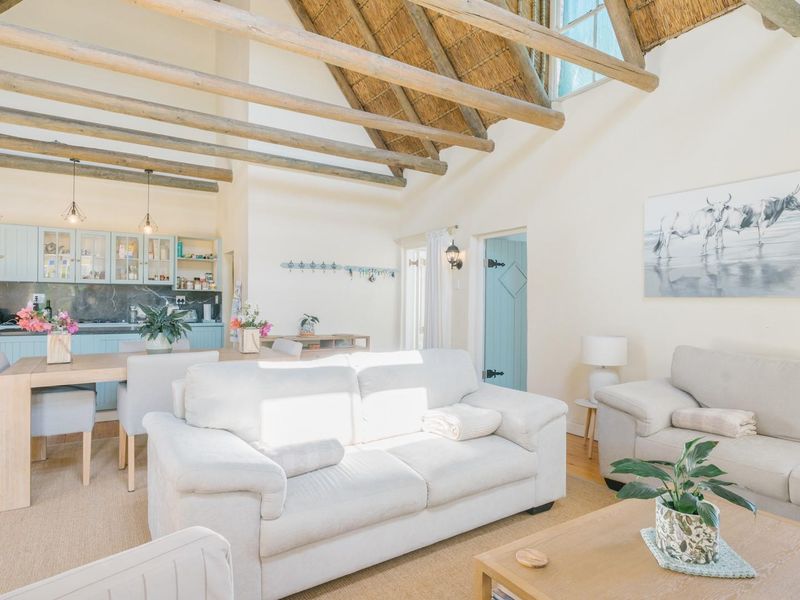 Immaculate Thatch Home with Guest Accommodation Potential - Photo 8