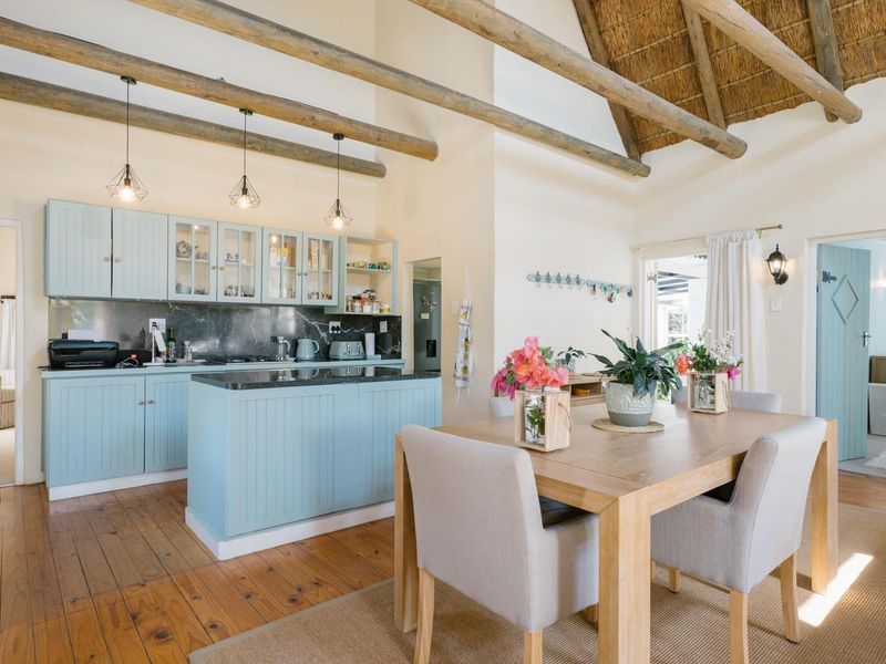 Immaculate Thatch Home with Guest Accommodation Potential - Photo 9