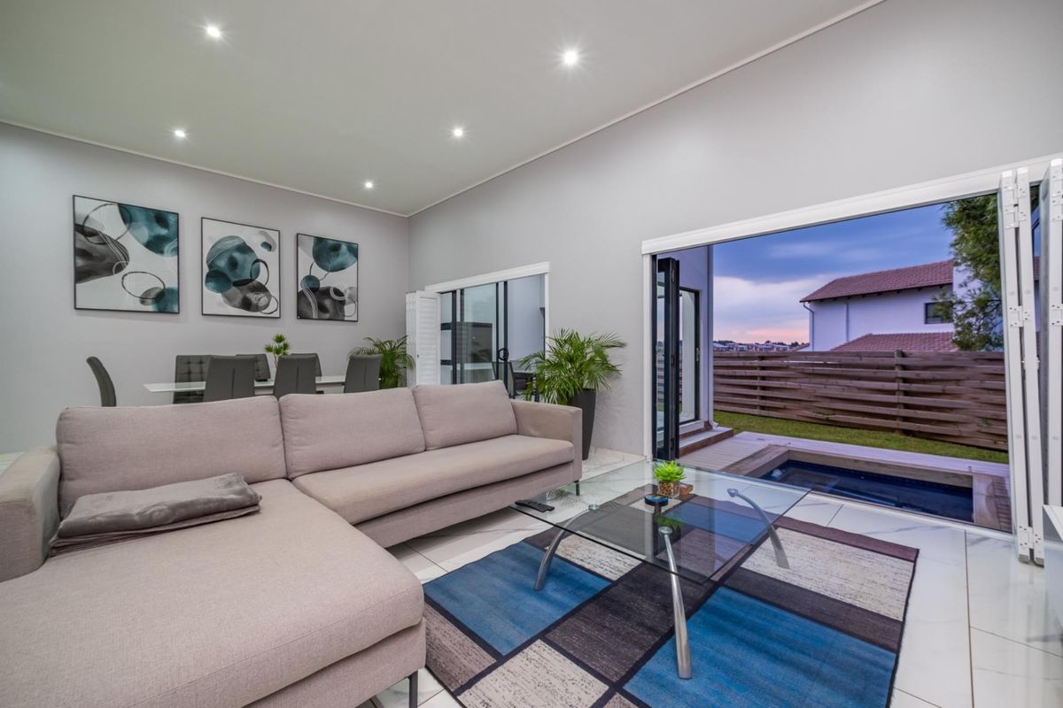 Modern Four-Bedroom Family Home in Secure Estate - Photo 4