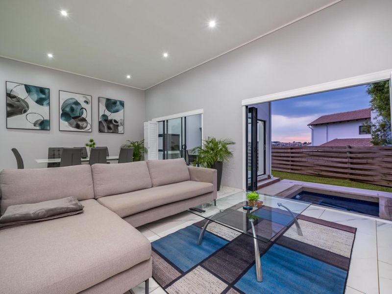 Modern Four-Bedroom Family Home in Secure Estate - Photo 4