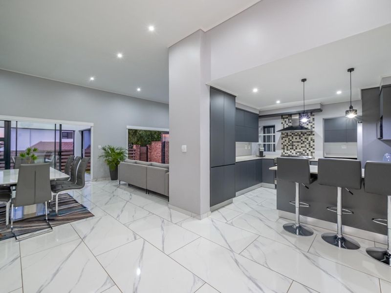 Modern Four-Bedroom Family Home in Secure Estate - Photo 6