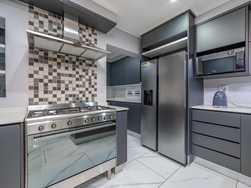 Modern Four-Bedroom Family Home in Secure Estate - Photo 9