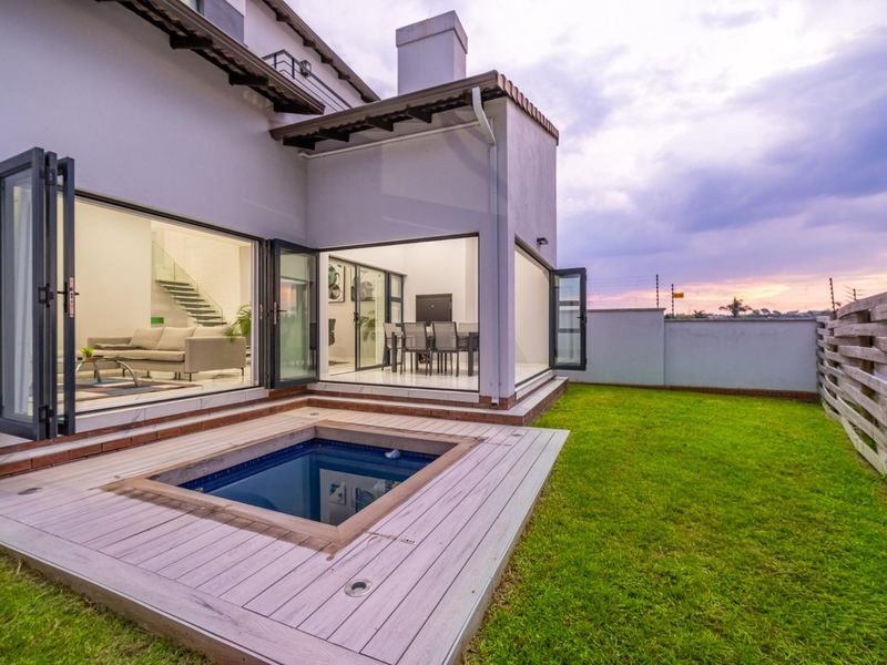 Modern Four-Bedroom Family Home in Secure Estate - Photo 1