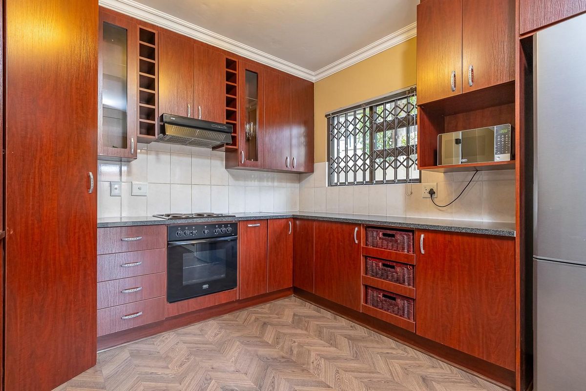 Neat family home with generator power in secure complex - Photo 2