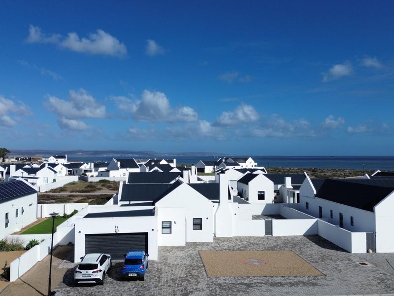 COASTAL CHARM MEETS EASY LIVING - JUST STEPS FROM THE BEACH - Photo 1