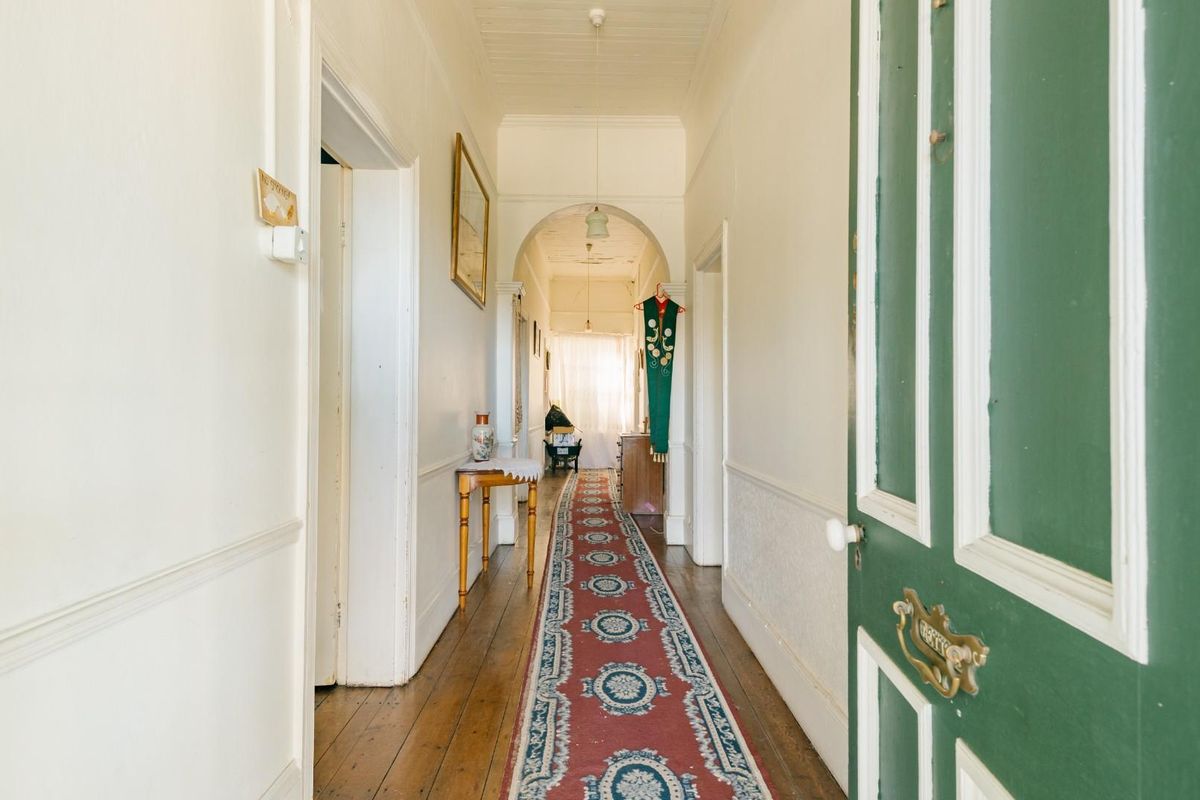 Unlock the Potential in This Charming Fixer-Upper! - Photo 3