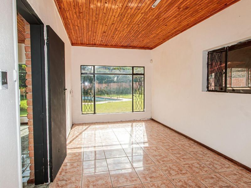 Spacious 3-Bedroom Home with Pool and Room to Add Your Touch - Photo 7