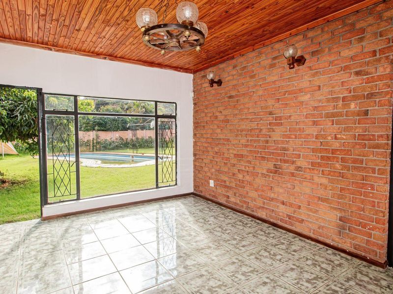 Spacious 3-Bedroom Home with Pool and Room to Add Your Touch - Photo 6