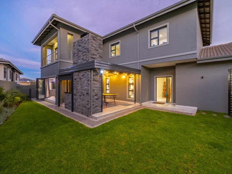 Modern Family Home with Entertainment Spaces and Backup Power in Olivewood Estate - Photo 1
