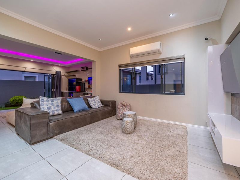 Modern Family Home with Entertainment Spaces and Backup Power in Olivewood Estate - Photo 10
