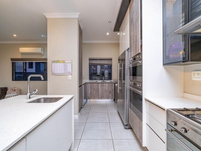 Modern Family Home with Entertainment Spaces and Backup Power in Olivewood Estate - Photo 8