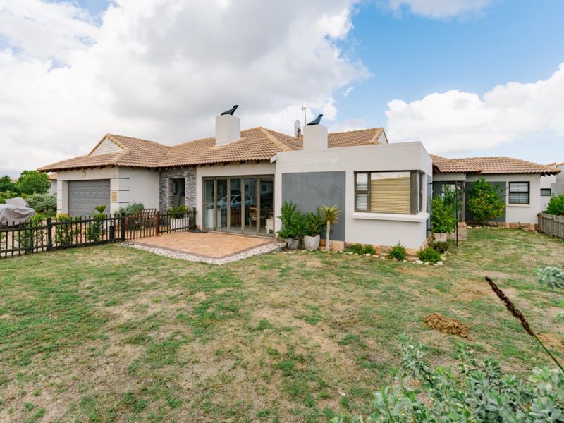 Spacious 4-Bedroom Corner Home with Greenbelt Views | Langebaan Country Estate - Photo 1
