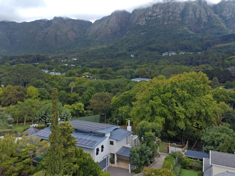 Privately positioned at the end of cul de sac this double volume home has sweeping mountain views - Photo 1