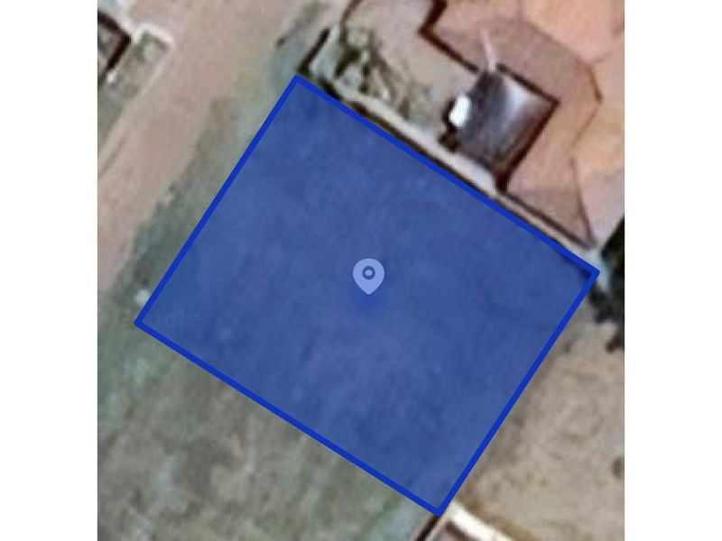 An aerial satellite view showing the boundaries of the vacant residential land plot.