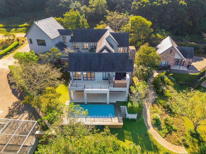 Exquisite Double-Storey Home with Timeless Elegance - Photo 2