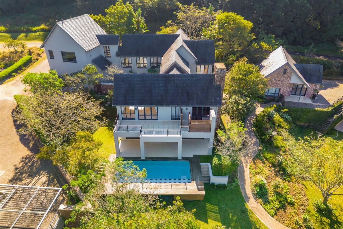 Exquisite Double-Storey Home with Timeless Elegance - Photo 2