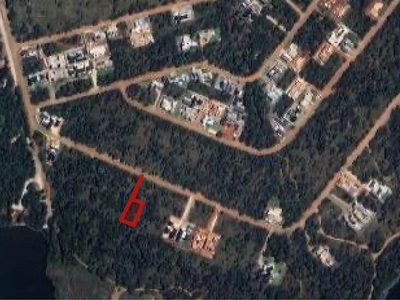 Aerial satellite view showing the location of the vacant residential land plot within the surrounding neighborhood.